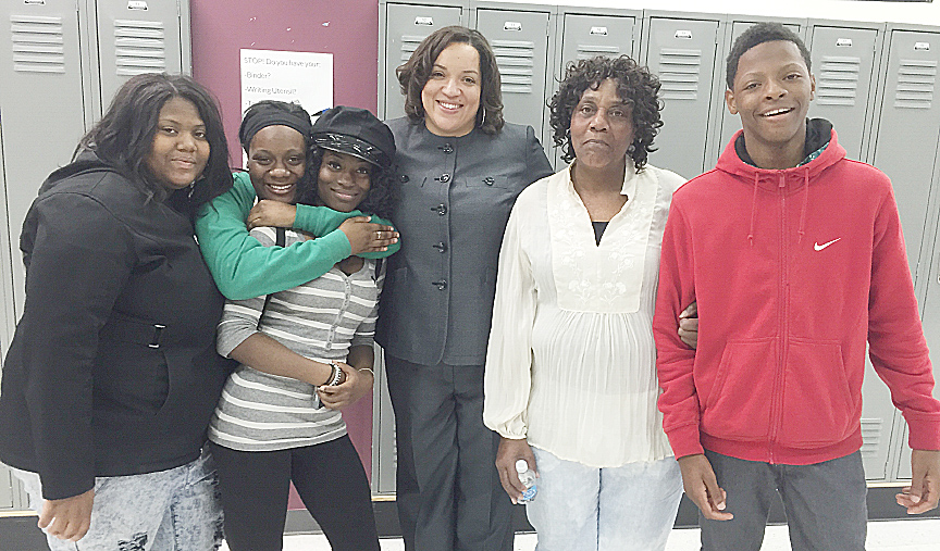 New MCA Principal Judith Parker (center) with students and parents on May 30.